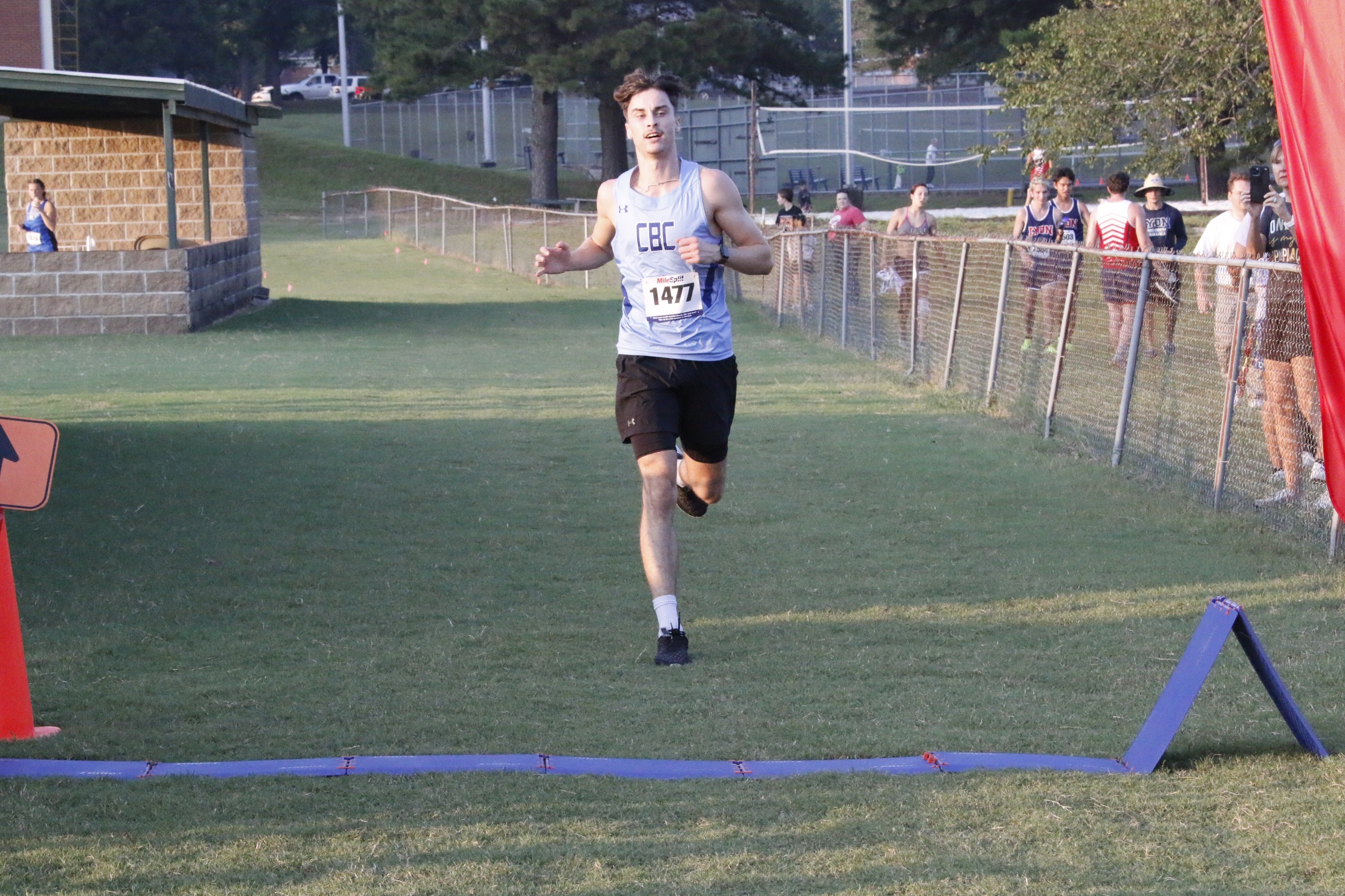 Josh Brown crosses the finish line at the Lyon Invitational